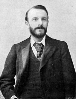 Jane Cook standing in front of her cottage