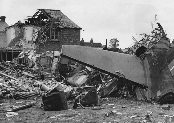 Crashed plane and half-demolished buildings